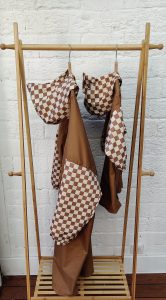 Poncho de pluie damiers - POULE PARTY